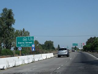 California 201 is a short east-west state route that begins here at this interchange and travels east through Kingsburg to Dinuba, Orosi, and Yettem before ending at California 245 north of Woodlake.