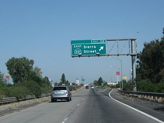 Northbound California 99 (Golden State Highway) meets Exit 112, California 201 (Sierra Street) east to Kingsburg and Sierra Street west to Conejo Avenue en route to Conejo and California 43.