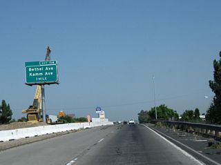 The next exit along California 99 north is Exit 114, Bethel Avenue and Kamm Avenue. Bethel Avenue travels north to the Sun-Maid Growers Visitor Center. This part of the Central Valley is famous for its raisins, which are dried grapes. Kamm Avenue is an east-west highway that meets Bethel Avenue at this interchange.