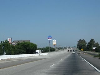 Upon crossing over California 201 (Sierra Street), California 99 north widens to three lanes. Plans call for all of California 99 in the San Joaquin Valley to be widened to three lanes in each direction; construction efforts are visible on the bridge over Sierra Street.