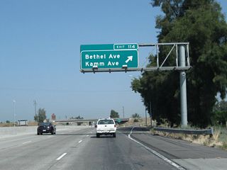 Northbound California 99 (Golden State Highway) meets Exit 114, Bethel Avenue and Kamm Avenue.