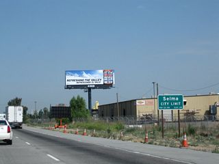 California 99 enters the city of Selma, the "Raisin Capital of the World." Selma had a population of 23,219 as of the 2010 Census and was incorporated on March 15, 1893.