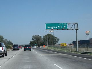 Northbound California 99 meets Exit 121, Manning Avenue. Gas is available at this interchange. Manning Avenue travels east to Parlier, Reedley, and Orange Cove (via California 63), and it leads west to Bowles, Raisin City, California 145, and San Joaquin.