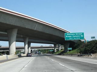 Passing under the California 41 freeway, the next exit along northbound California 99 (Golden State Highway) is Exit 132A, Ventura Street and Kings Canyon Road. For access to California 180, use Exit 133.