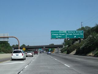 Northbound California 99 (Golden State Highway) meets Exit 132A, Ventura Street and Kings Canyon Road. Ventura Street forms part of the downtown street grid pattern, with connections to Fulton Mall via Van Ness Avenue, Courthouse Park via M Street, and the Convention Center complex. Ventura Street / Avenue is the old alignment of California 180 through downtown. As part of this interchange, Historic U.S. 99/Golden State Boulevard merges back onto the California 99 freeway.