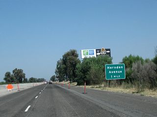 The next exit along California 99 north is Exit 143, Herndon Avenue. This will be the final interchange along California 99 within Fresno County. Note ongoing construction to expand the freeway in 2011.