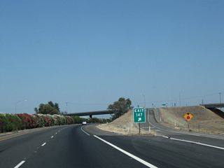 Avenue 9 passes over both the California 99 freeway and the Burlington Northern Santa Fe Railroad. Use Avenue 9 east to Gregg and California 41.