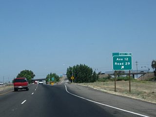 Northbound California 99 meets Exit 151, Avenue 12 and Road 29.