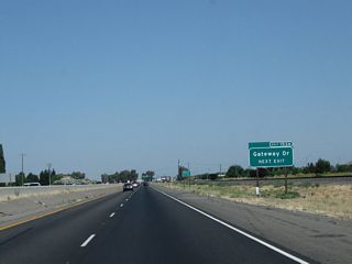 Gateway Drive (California 99 Business) will rejoin California 99 at Exit 156 (Gateway Drive and Kennedy Street).