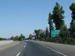 Northbound California 99 reaches Exit 155, Cleveland Avenue.