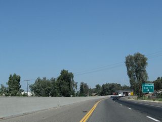Northbound California 99 reaches Exit 156, Avenue 16.