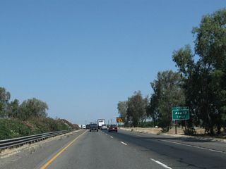 Leaving Madera, the next exit along California 99 north is Exit 157 for Avenue 17.