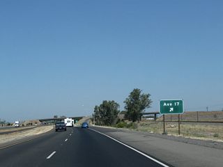 Northbound California 99 reaches Exit 157, Avenue 17.