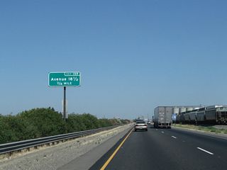 The next exit along California 99 is Exit 159, Avenue 18 1/2 (0.75 mile).