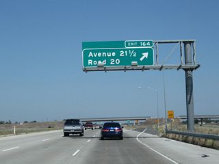 Soon thereafter, northbound California 99 reaches Exit 164, Avenue 21 1/2 and Road 20 to Fairmead.
