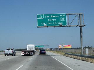 Northbound California 99 approaches Exit 166, California 152 west to Los Banos and Gilroy. California 152 is a major, east-west expressway connecting the Central Valley with the Central Coast, with connections to Gilroy, Watsonville, and Santa Cruz via California 152 west and Hollister and Monterey via California 156 west. With interchanges at California 33 and Interstate 5, much of the expressway between California 156 and California 99 is almost like a freeway.