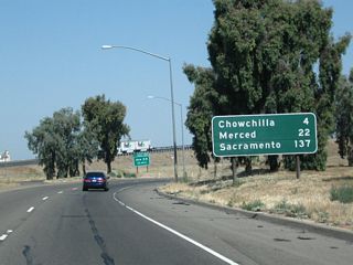 This mileage sign along California 99 (Golden State Highway) north provides the distance to Chowchilla (four miles), Merced (22 miles), and Sacramento (137 miles).