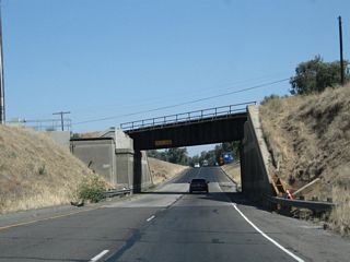 Continuing under the railroad bridge, this subway would have to be widened in order to accommodate a minimum of three northbound lanes, as is the plan for the entire Route 99 corridor from Wheeler Ridge north to Sacramento.