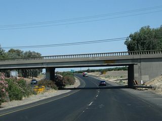 An older bridge carries Avenue 24 over California 99 (Golden State Highway).
