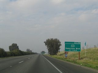 The next exit along California 99 north is Exit 170, California 233 (Robertson Boulevard) southwest and Avenue 26 east (one mile). This is the principal exit into Chowchilla.