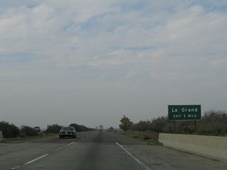 The next exit along California 99 north is Exit 171, Minturn Road (Road 15) to Le Grand. The community of Le Grand is located in Merced County, several miles north of this interchange along Minturn Road.