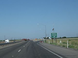 Northbound California 99 reaches Exit 172, Weigh Station. Until 2015, California 99 had a 13-mile, at-grade expressway between the county line and the southern outskirts of Merced. A freeway upgrade project, known as the Plainsburg Road Freeway and Le Grand Freeway projects, removed these at-grade intersections in 2014 and 2015. The northbound lanes of California 99 were placed on a new alignment, and interchanges were added at Plainsburg Road (Exit 176) and Le Grand Road (Exit 179).
