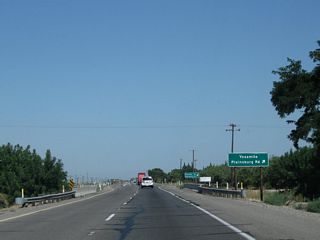 The next intersection along California 99 north is Plainsburg Road, which travels north to Plainsburg and ends at California 140 in Planada. At Planada, turn east on California 140 to Mariposa and Yosemite National Park.
