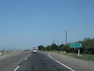 Northbound California 99 meets Plainsburg Road, which travels north to Planada (eight miles) and connects to Mariposa via California 140 east (36 miles).