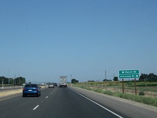 The next intersection along California 99 north is with Ranch Road south and Arboleda Drive north. Arboleda Drive is a through route that eventually connects to California 140 east of Merced.