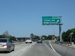 Northbound California 99 meets Exit 186A, Childs Avenue and Motel Drive. The next exit is Exit 186B, California 140 east.
