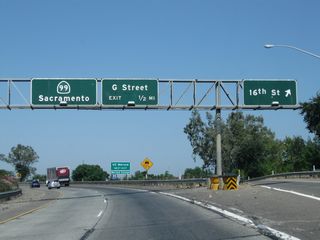Northbound California 99 meets Exit 186C, California 99 Business/16th Street north to downtown Merced. The business loop serves the city of Merced, the Merced County seat. The next exit is Exit 187A, G Street, one-half mile. Immediately after this off-ramp, an on-ramp brings traffic from California 140 west onto California 99 north. The two routes share alignment briefly, between Exits 186C and 188.