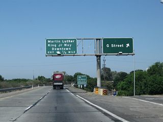 Northbound California 99 reaches Exit 187A, G Street. The second off-ramp connects to Exit 187B, California 59/Martin Luther King, Jr. Way south and Martin Luther King, Jr. Way north.