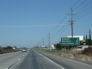 This mileage sign along California 99 north provides the distance to Atwater (six miles), Stockton (65 miles), and Sacramento (112 miles). Modesto, which appeared in the previous mileage sign, is omitted here.