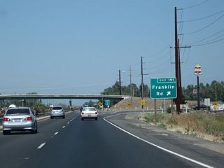 Northbound California 99 meets Exit 191, Franklin Road.