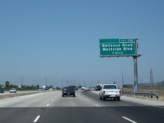 The next exit along California 99 north is Exit 198, Bellevue Avenue east and Merced County Route J-18 (Westside Boulevard) west across the Central Valley to meet Interstate 5 at the Stuhr Road interchange (Exit 423).