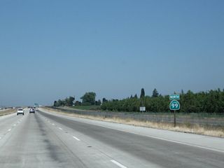 A California 99 north confirming marker is posted after the on-ramp from Westside Boulevard and Bellevue Avenue.