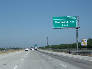 The next interchange along northbound California 99 is Exit 201, Hammatt Avenue (one mile).