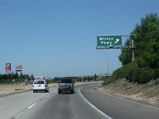 Northbound California 99 meets Exit 203, Winton Avenue. Connections may be made from Winton Avenue east to Livingston-Cressey Road en route to the McConnell State Recreation Area along the Merced River and the community of Cressey at Merced County Route J-7 (Santa Fe Drive). Gas and food are available at this interchange.