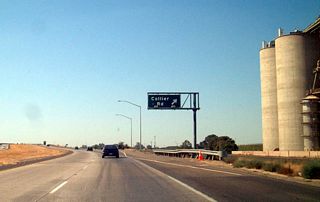 Northbound California 99 reaches Exit 204, Collier Avenue.