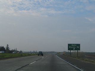 Northbound California 99 meets Exit 207, Shanks Road. Use Shanks Road southwest into Delhi. We are now about midway between Livingston and the next city of consequence, Turlock.