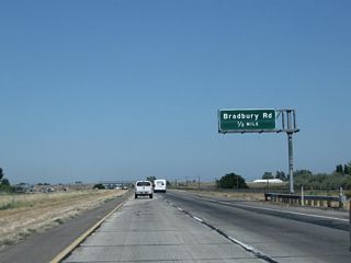 The next exit along northbound is Exit 208, Bradbury Road. As recently as the mid-1990s, this interchange was an at-grade intersection.