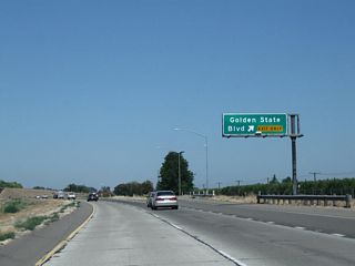Northbound California 99 reaches Exit 209, California 99 Business (Golden State Boulevard) north to Turlock. The southern end of this business loop is reminiscent of the south end of the Bakersfield business route at the far southern end of Union Avenue.