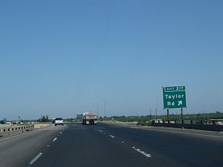 Northbound California 99 meets Exit 217, Taylor Road.