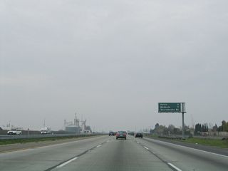 This mileage sign along California 99 north provides the distance to Ceres (three miles), Modesto (seven miles), and Sacramento (86 miles).