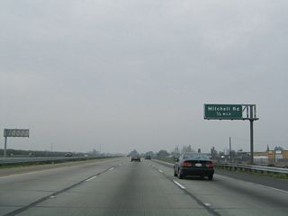 The next exit along California 99 north is Exit 220, Mitchell Road (0.50 mile).