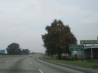 California 99 north approaches Exit 229, Carpenter Road and Briggsmore Avenue to California 99 Business (Ninth Street) south.