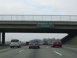 The next exit along California 99 north is Exit 232, Pelandale Avenue (1.25 miles).