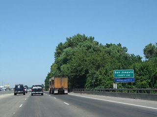 California 99 leaves Stanislaus County and enters San Joaquin County as the freeway crosses over the Stanislaus River, a major tributary of the San Joaquin River.