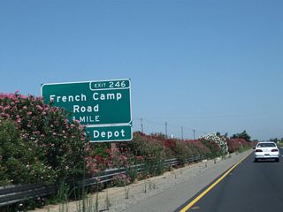 The next exit along northbound is Exit 246, San Joaquin County Route J-9 (French Camp Road) in one mile.