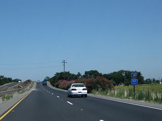 San Joaquin County Route J-9 is a diagonal route, connecting California 99 with Five Corners and Simms (California 120) to the southeast and French Camp and Interstate 5 to the northwest.
